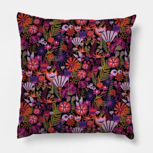 Purple and red flowers with green leaves on a black background. Distressed vintage look. Bright flowers on a dark background. Pillow