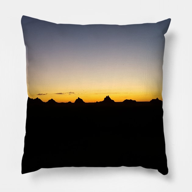 Sunset Over the Badlands Pillow by jeisenmann