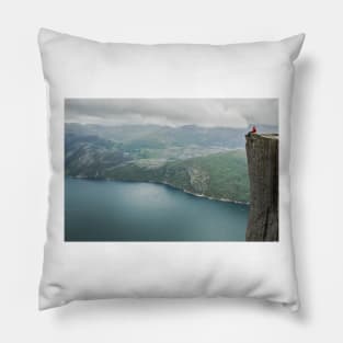 At the edge of a cliff Pillow