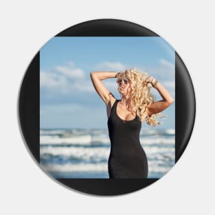 Sexy woman on the sea shore Pin