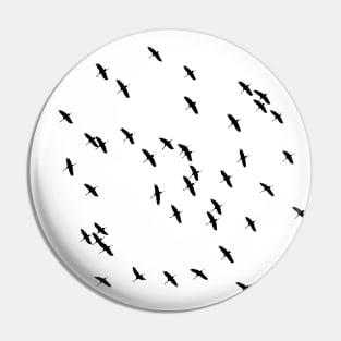 A Flock of Flying Birds in Black and White Pin