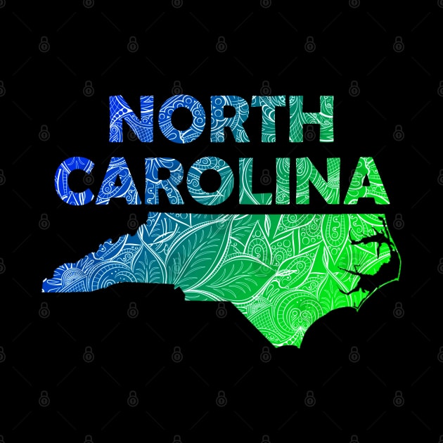 Colorful mandala art map of North Carolina with text in blue and green by Happy Citizen