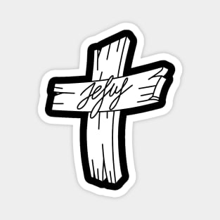 A wooden cross with the inscription Jesus. Magnet