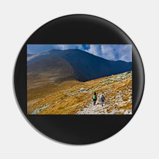 Mother and son hiking into the mountains Pin