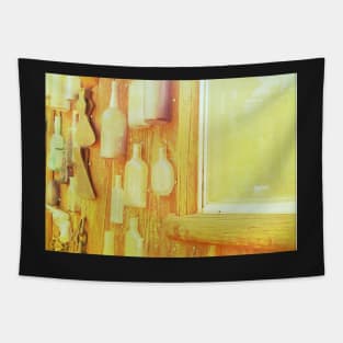 Yellow Bottles Hanging on a Wall Tapestry