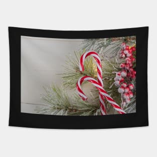 Bright Christmas or New Year wooden background with fir branches, Christmas decorations. Christmas sweets. Copy space. View from above Tapestry