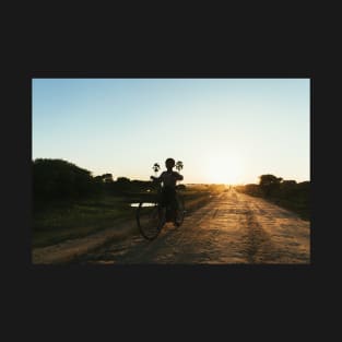 Silhouette of Boy Riding Bicycle at Sunset in Burmese Countryside T-Shirt