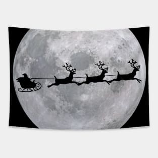 Santa and his sleigh flying across the moon at Christmas time! Tapestry