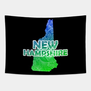 Colorful mandala art map of New Hampshire with text in blue and green Tapestry