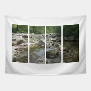 A static shot of the clear water of a mountain stream between rocks and stones; beautiful nature in a sunny day; no people around Tapestry