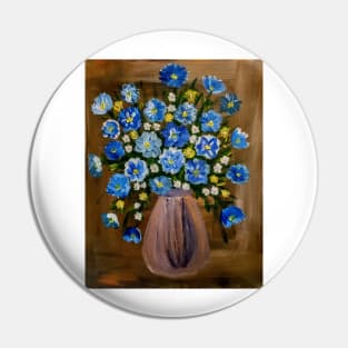 Some blue corn flowers and white and yellow daisy's flowers in a metallic vase Pin