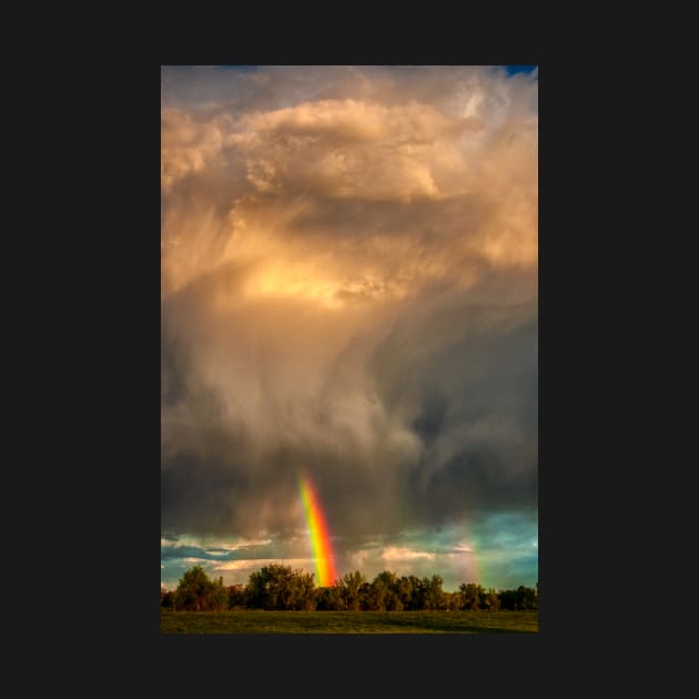 Storm Cloud Sprays a Rainbow by nikongreg