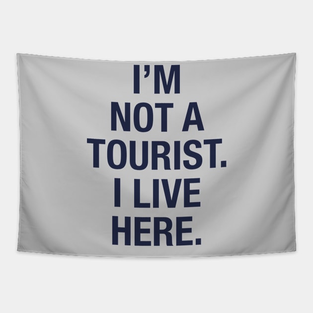 I'm not a tourist. I live here. (navy) Tapestry by LetsOverThinkIt