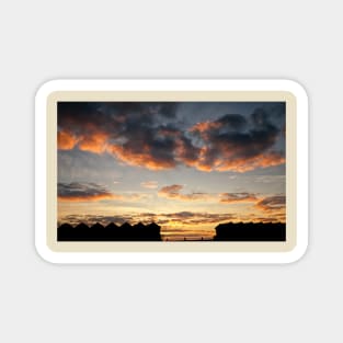 Silhouetted Beach Huts at Blyth Magnet