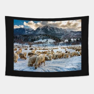 Flock of sheep at the bottom of the mountain Tapestry