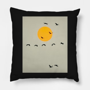 Common Cranes Flying in Front of Orange Setting Sun Pillow