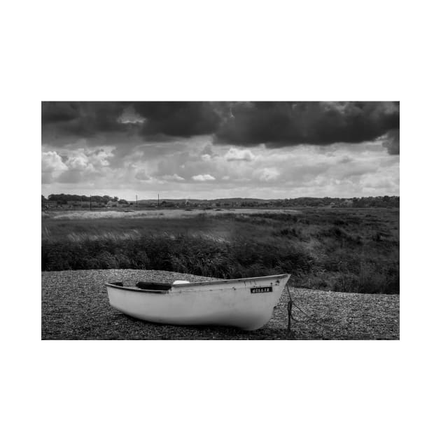 Boat on a shingle beach by avrilharris