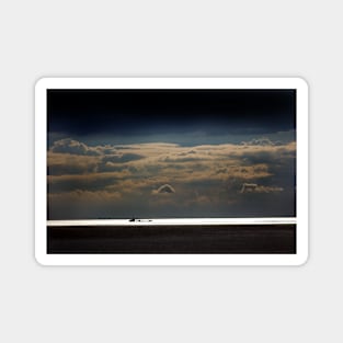 Sealight - clouds over The Wash as a ship moves along the coast near Hunstanton, Norfolk Magnet