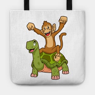 Comic - monkey sitting on turtle Tote