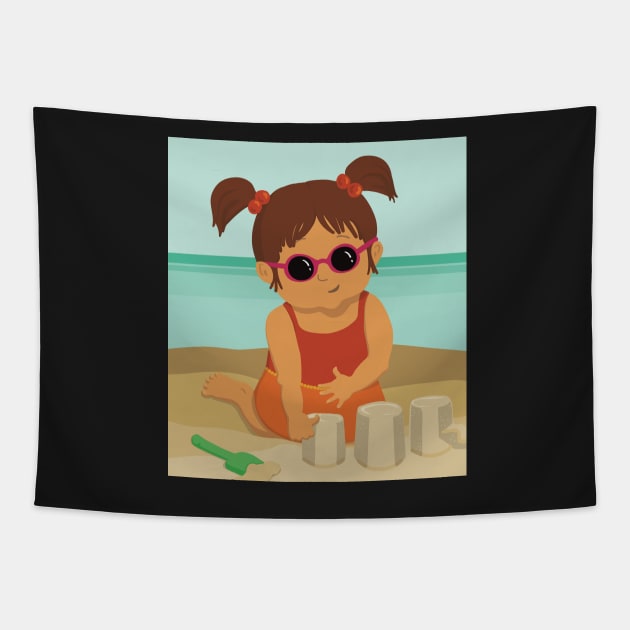 Cute little summer girl is on vacation building a sand castle on the beach Tapestry by marina63