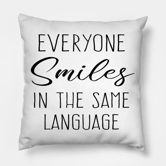Everyone smiles in the same language Pillow by FlyingWhale369
