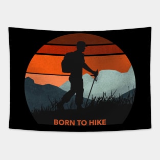 Silhouette of a man hiking in the mountains during sunrise Tapestry