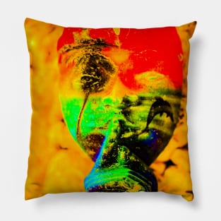 A red green Bali face mask on yellow Pillow