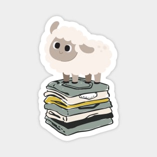 Cute Baby Sheep on top of folded clothes Magnet