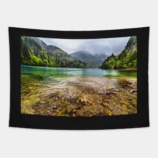 Lake in mountains, in a rainy day Tapestry