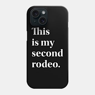 "This is my second rodeo." in plain white letters - cos you're not the noob, but barely Phone Case