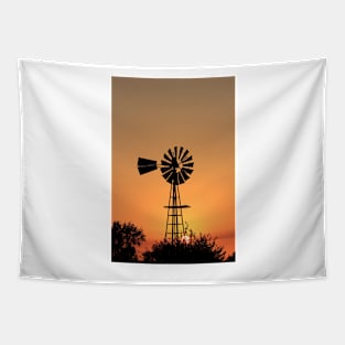 Kansas Golden Sunset with a Windmill silhouette. Tapestry