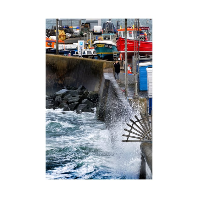 Photographer on the seafront  - Seahouses, Northumberland, UK by richflintphoto