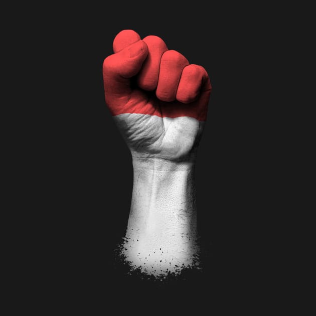 Flag of Indonesia on a Raised Clenched Fist by jeffbartels