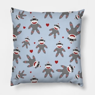 Cute Sock Monkey Pattern on Blue Pillow