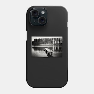 Black and white photograph of a wooden pier on a lake surrounded by a forest Phone Case