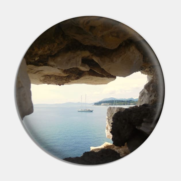 Seaside Serenity: Corfu Boat View Through Rock Window Pin by HFGJewels