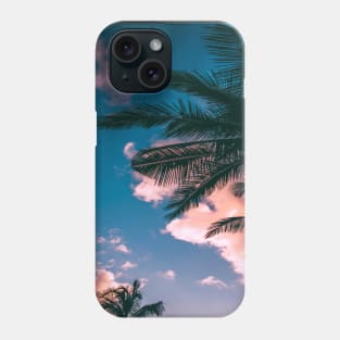 Green and brown coconut trees under clear blue sky Phone Case