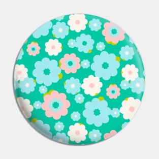 Small blue, white and pink flowers over a turquoise background Pin