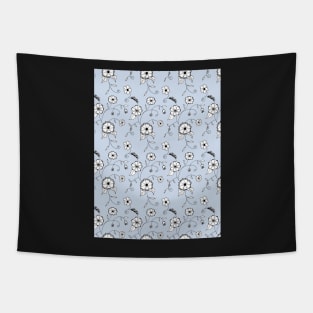 Whimsical flower pattern with a light blue background Tapestry