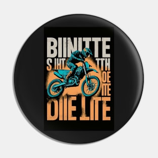 Dirt bike rider w/ orange and grey lettering Pin