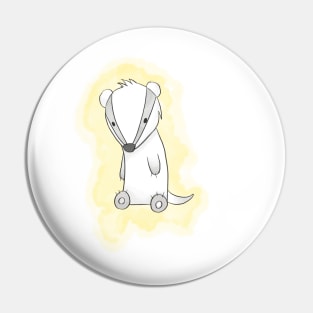 A yellow badger Pin