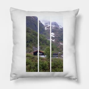 Wonderful landscapes in Norway. Vestland. Beautiful scenery of houses with grass roof. Norwegian traditional architecture Mountains, trees and snow in background. Cloudy day (vertical) Pillow