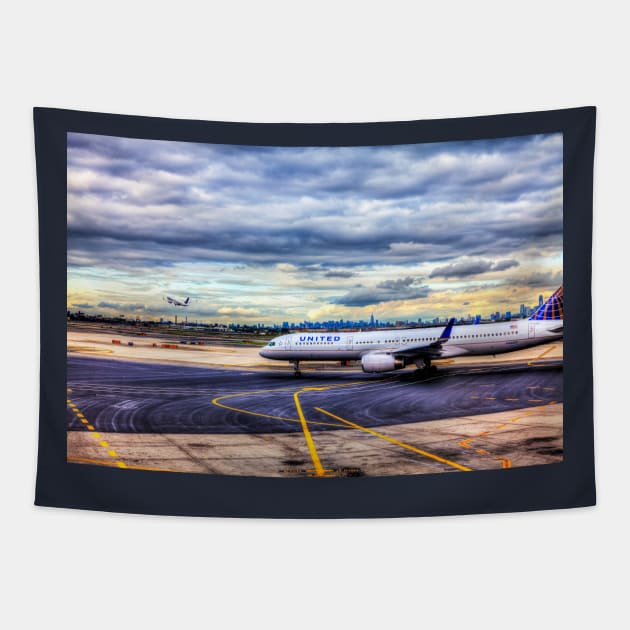 United Airlines And Manhattan Skyline At JFK Airport, New York Tapestry by tommysphotos