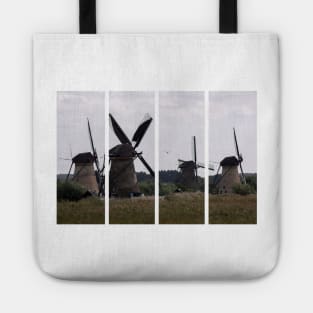 Wonderful landscapes in the Netherlands. Historic dutch windmills in Kinderdijk in a cloudy autumn day. Unesco site. Natural view from distance. Tote