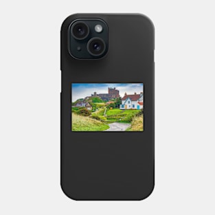 View of Bamburgh village and castle, Northumberland, UK Phone Case