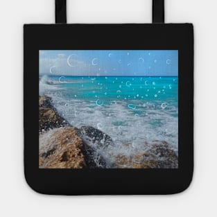 Rocky beach ocean spray, On the rocks, ocean waves surfing the rocks of a splashing dashing restless Caribbean Sea Tote