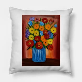 A lovely boutique of abstract vibrant bright colorful  flowers in a tall turquoise glass vase Pillow