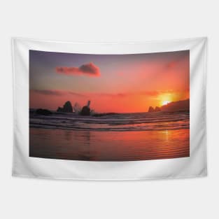 Waves crashing into rock at sunset Tapestry