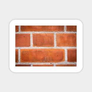 Red brick background clloseup pattern with white grout lines. Magnet