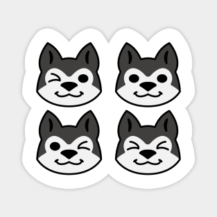 Four Black and White Siberian Huskies Magnet